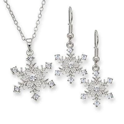 Snowflake Pendant in sterling silver with a sparkling centre.